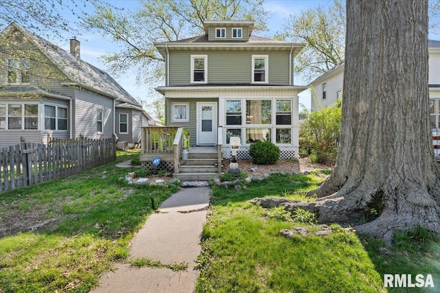 view of front of home with a front lawn