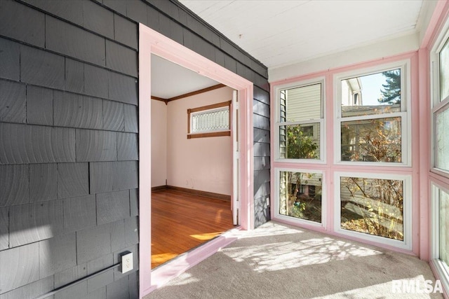 view of unfurnished sunroom