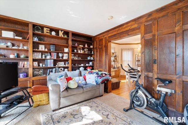 interior space featuring light hardwood / wood-style flooring and crown molding