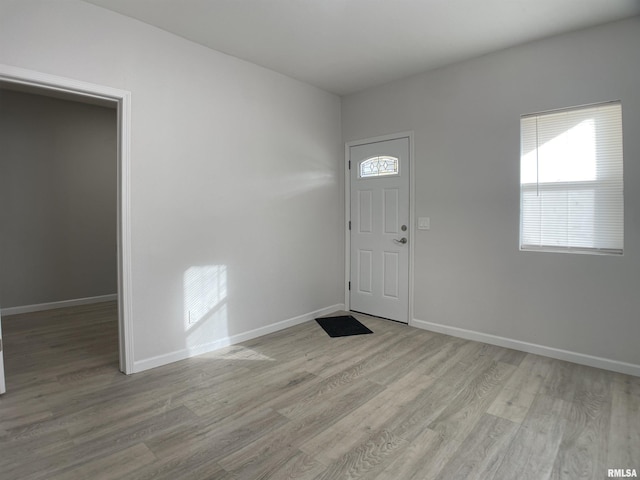 foyer with light wood-type flooring