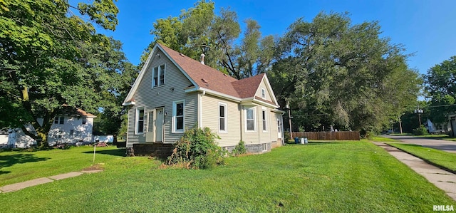 view of property exterior featuring a lawn