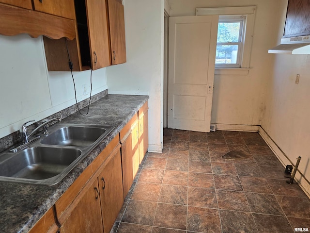 kitchen with extractor fan and sink