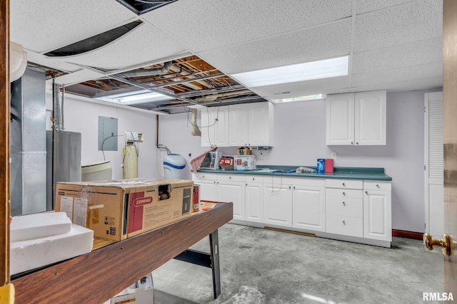 107 Hilltop St, Colona, IL 61241 - basement with water heater and electric panel