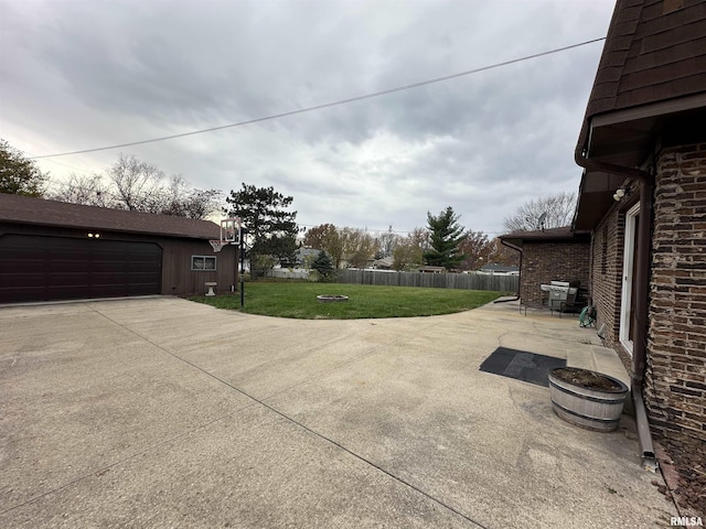 107 Hilltop St, Colona, IL 61241 - view of patio featuring an outbuilding