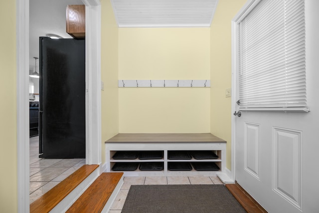 mudroom with light tile patterned floors