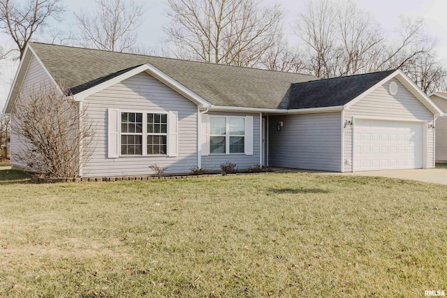 ranch-style house featuring a garage and a front lawn