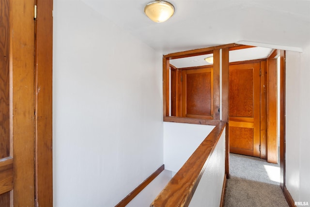 hallway with light carpet