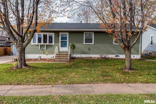 ranch-style house featuring a front yard