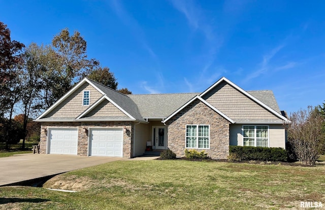 view of front facade featuring a garage and a front lawn