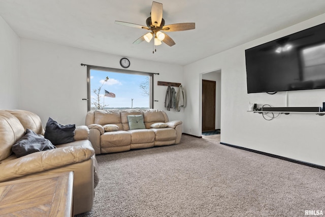 carpeted living room featuring ceiling fan