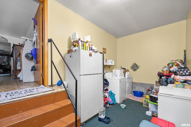 laundry room with washing machine and clothes dryer