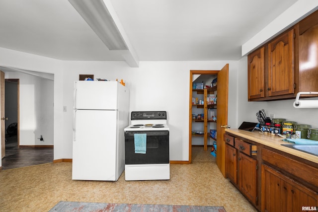 kitchen featuring white appliances