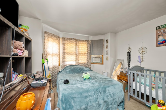 bedroom featuring cooling unit and carpet floors