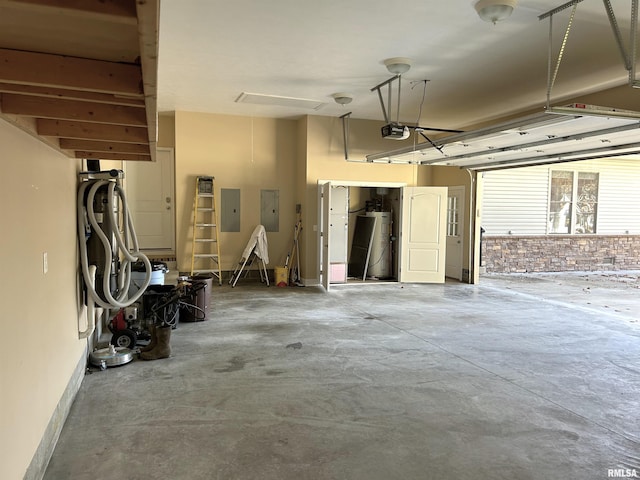 garage with electric panel, water heater, and a garage door opener