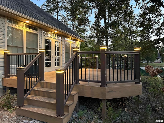 wooden terrace featuring french doors