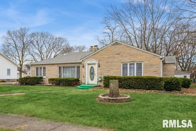 view of front of home with a front lawn