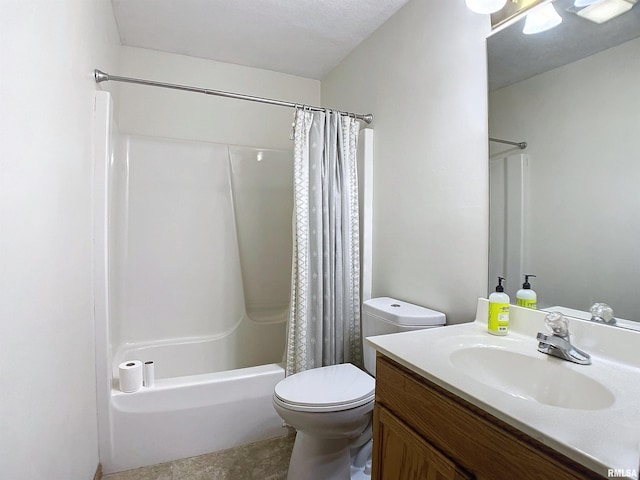 full bathroom featuring shower / tub combo with curtain, vanity, a textured ceiling, and toilet