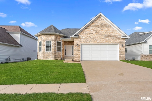 view of front of house with central AC, a garage, and a front lawn