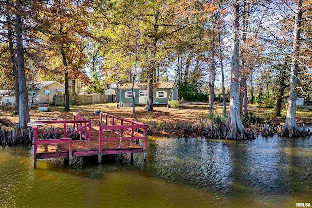 view of dock with a water view