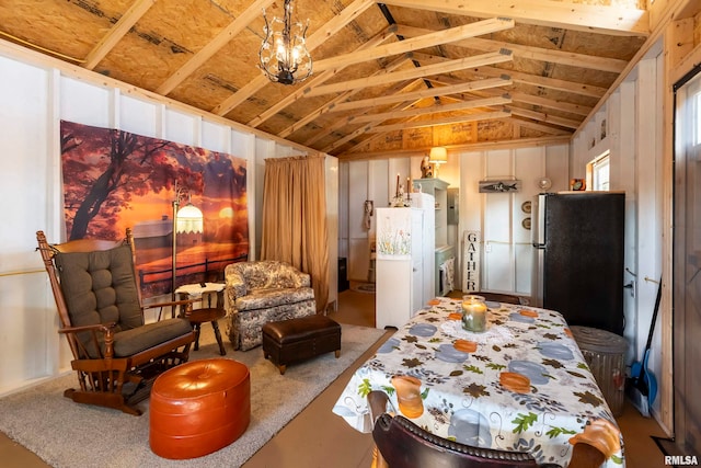 bedroom featuring electric panel, stainless steel fridge, and lofted ceiling