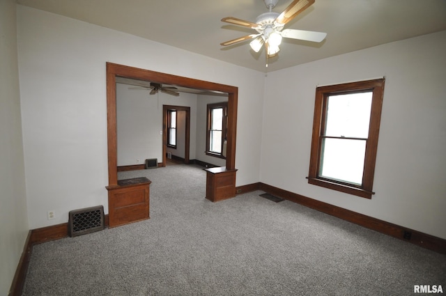 1815 Belle Ave, Davenport, IA 52803 - empty room with ceiling fan, carpet flooring, and baseboards