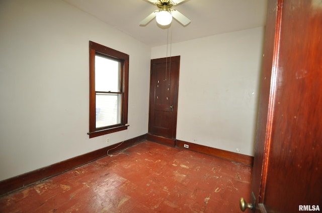 1815 Belle Ave, Davenport, IA 52803 - empty room featuring baseboards and a ceiling fan