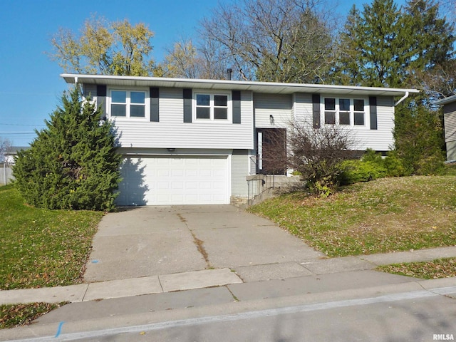 raised ranch featuring a garage