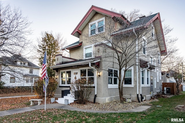 view of front of property featuring central AC unit