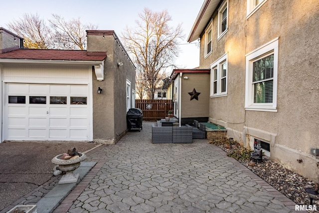 view of side of property featuring an outdoor hangout area