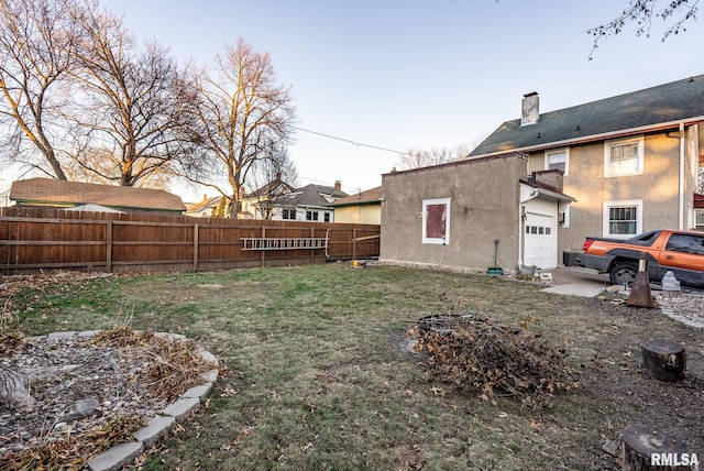 view of yard with a garage