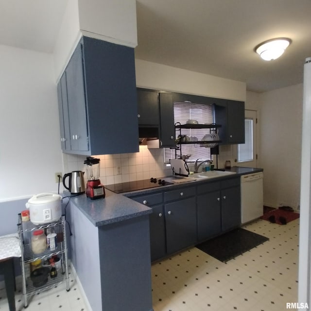 kitchen featuring black electric cooktop, sink, backsplash, and white dishwasher