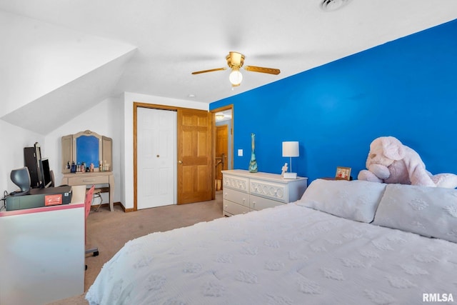 carpeted bedroom featuring ceiling fan and lofted ceiling