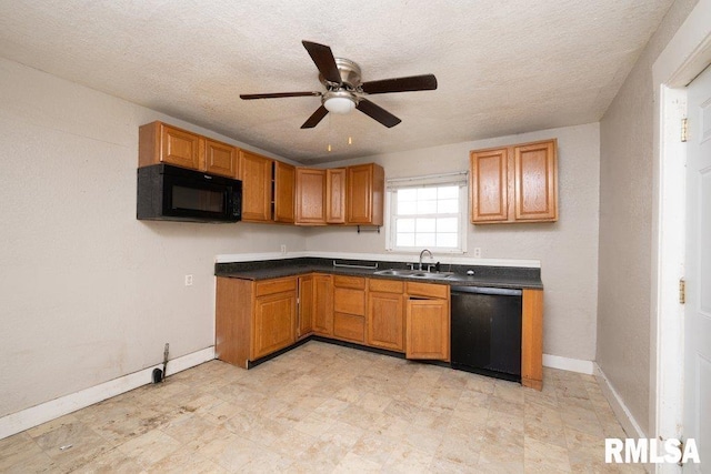 kitchen featuring black appliances, ceiling fan, sink, and a textured ceiling