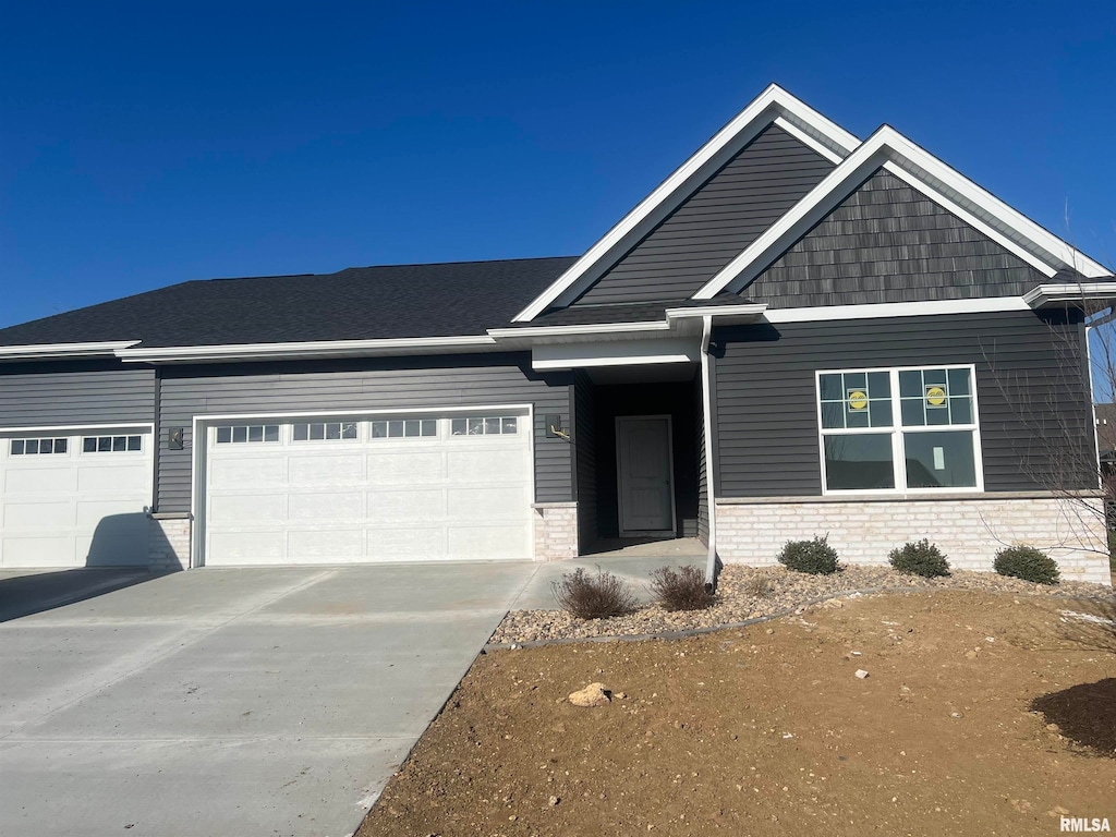 craftsman-style house featuring a garage