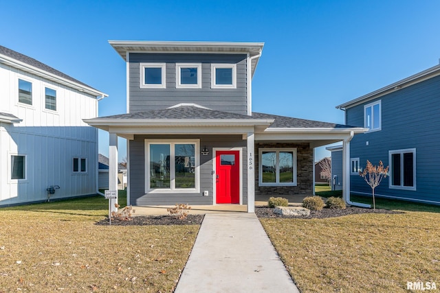 view of front facade featuring a front yard