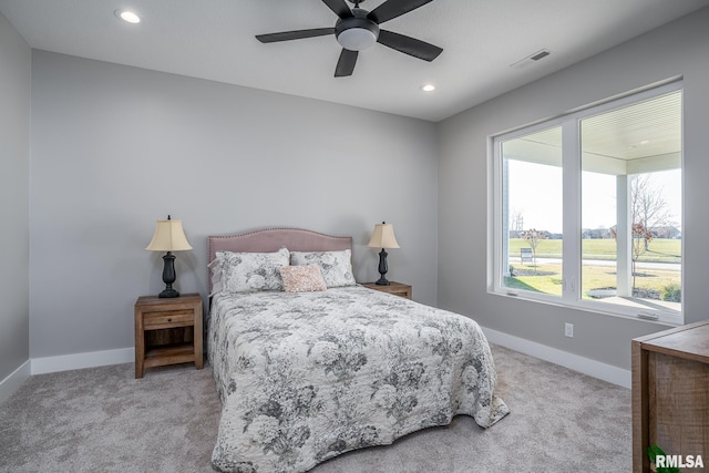 carpeted bedroom featuring ceiling fan