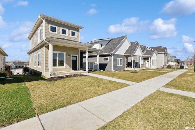 view of front of property with a front lawn