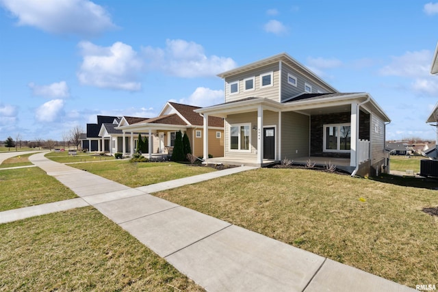 view of front facade featuring a porch and a front yard