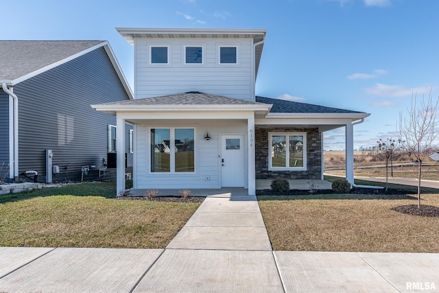 view of front of property with a front yard