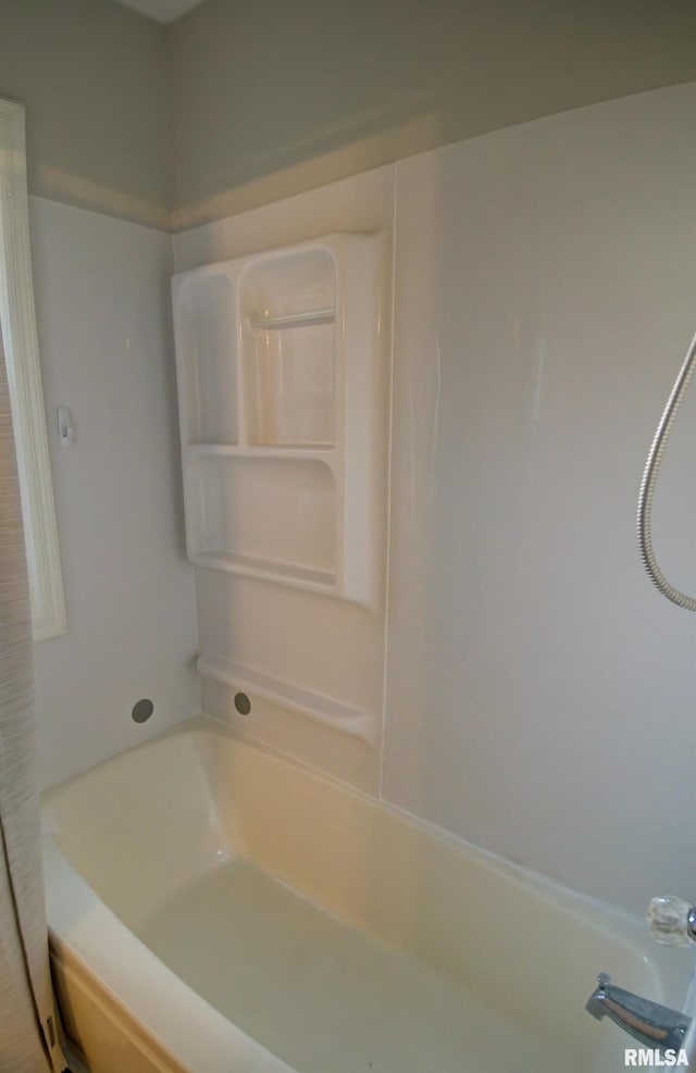 bathroom with shower / washtub combination