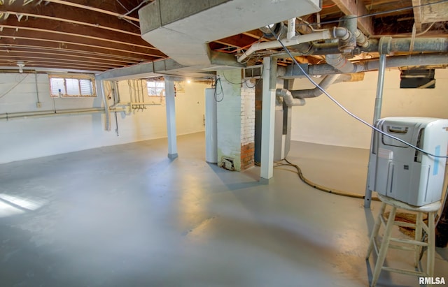 basement featuring gas water heater