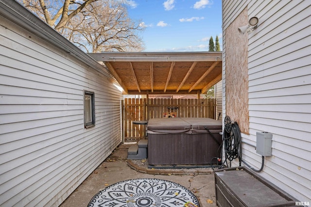 view of patio / terrace featuring a hot tub