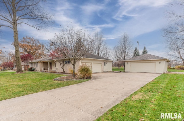 ranch-style home featuring a front yard and a garage