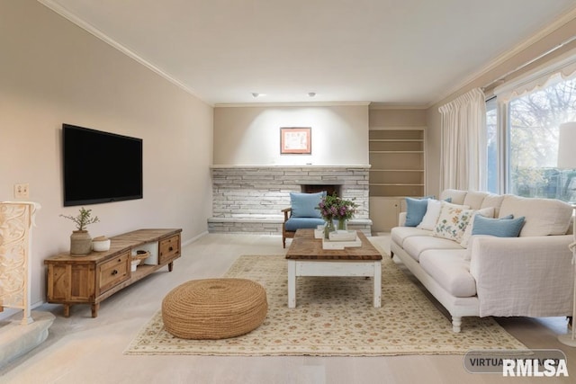 living room featuring built in shelves and ornamental molding