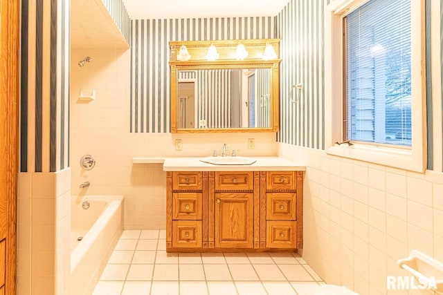 bathroom featuring tile walls, vanity, and tile patterned flooring