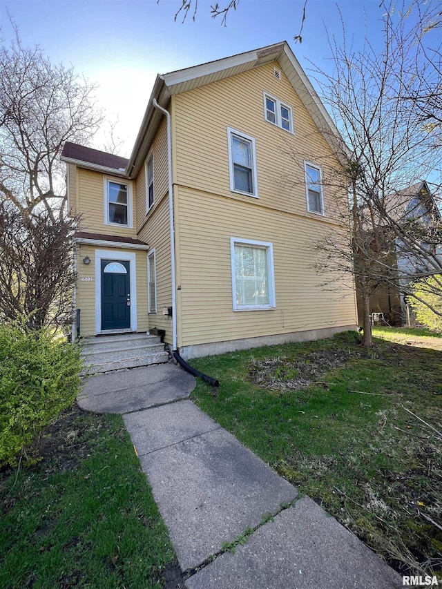 exterior space featuring a yard