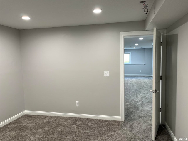 unfurnished room featuring carpet floors