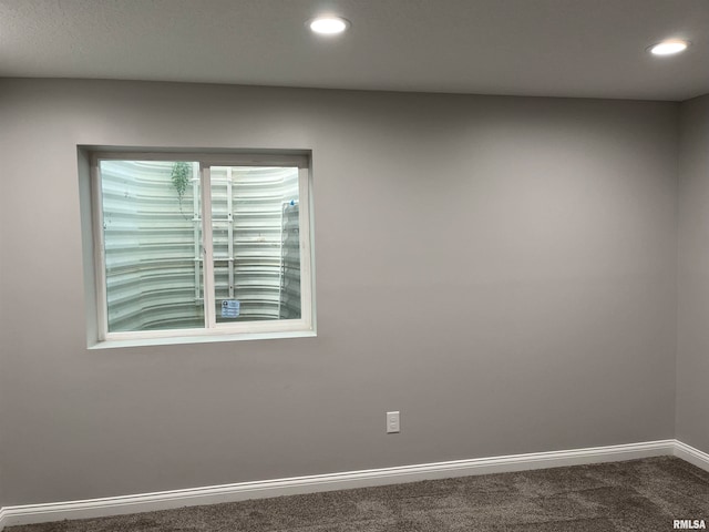 unfurnished room with carpet floors