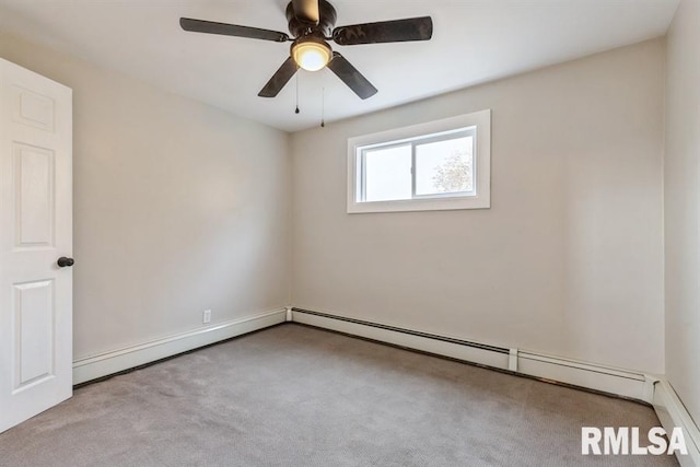 carpeted empty room featuring ceiling fan and a baseboard heating unit