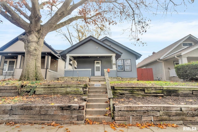 bungalow featuring covered porch